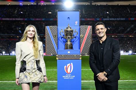 Sophie Turner and Dan Carter Dazzle in Louis Vuitton .